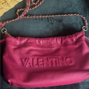 Valentino bag in color Lipstick Red. Super playful and perfect for a night out.